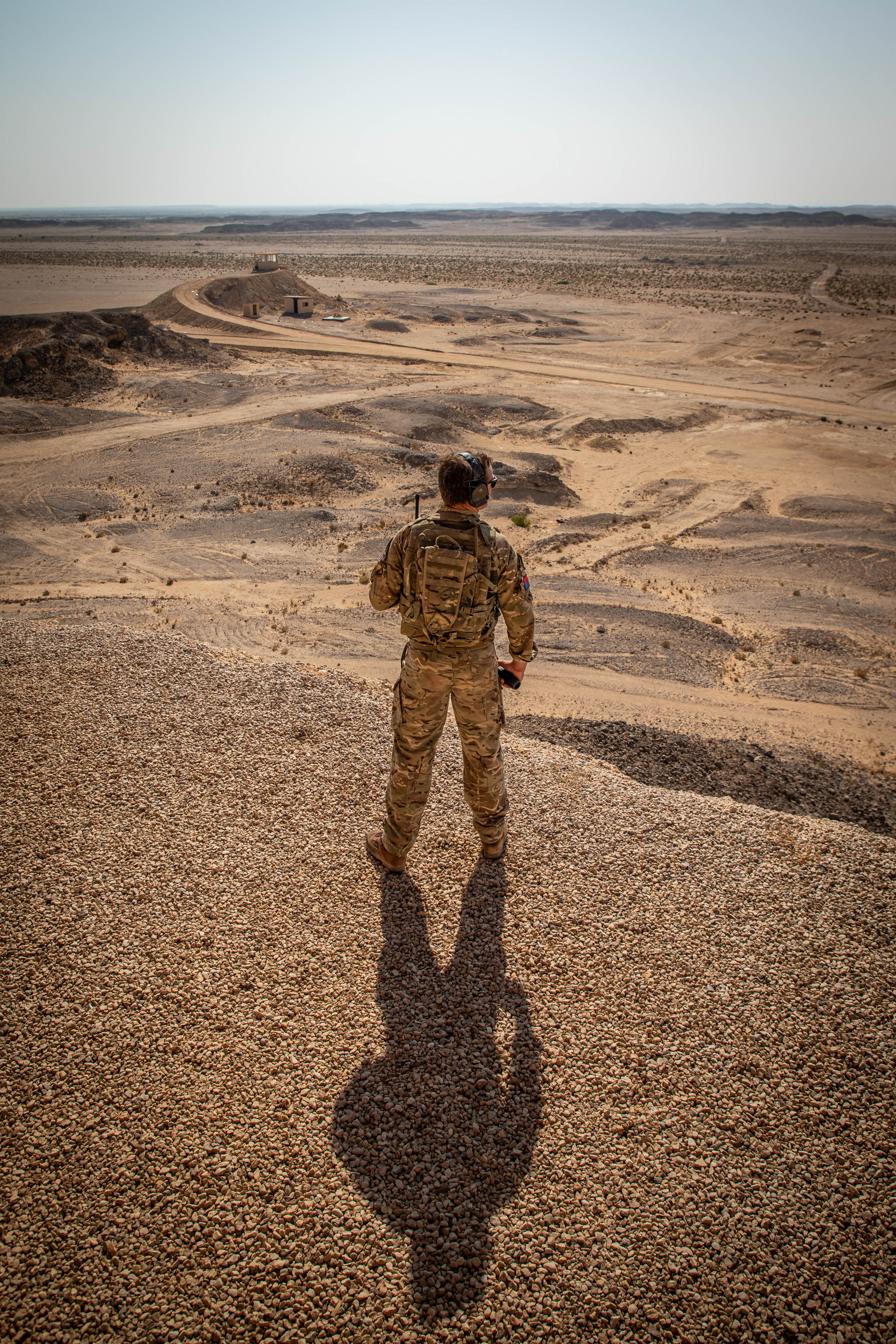 RAF Regiment looks across Omani desert.